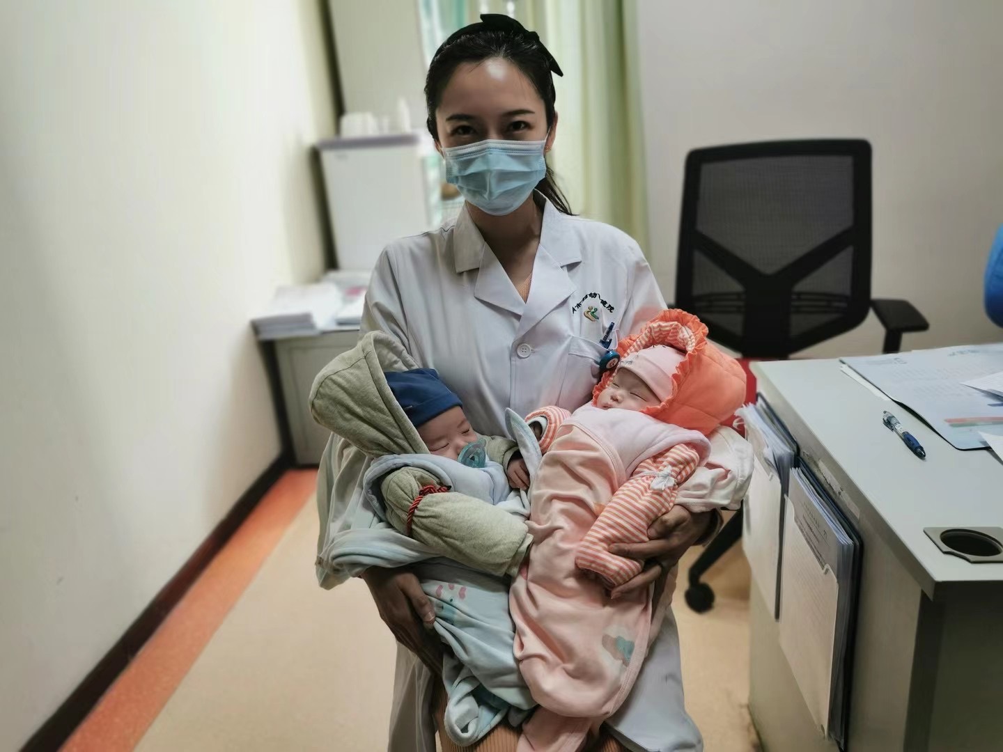 Following repeated implantation challenges and thin endometrial lining, she received integrative fertility support. Her embryo transfer resulted in beautiful twins.